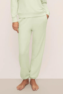 Model is wearing French Terry Jogger in Matcha