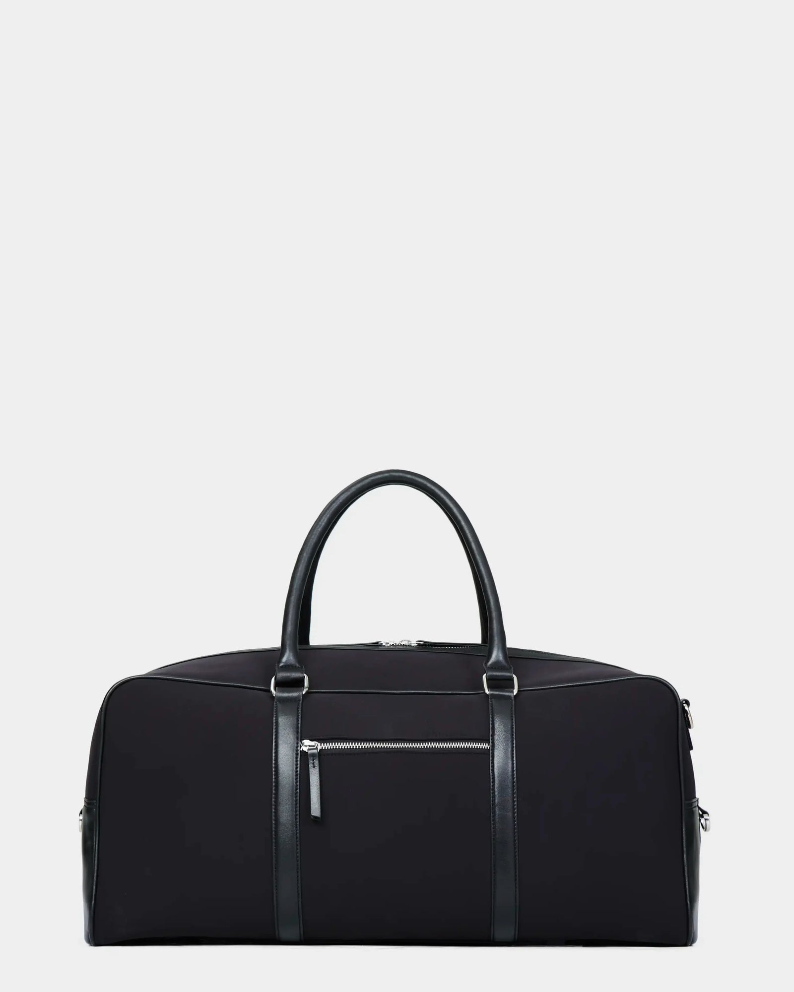 The Rudsak OLIVER - 9323507 Black is a unisex duffel bag with leather handles and trim, a front zippered pocket, and a minimalist design—an ideal luxury travel companion, shown against a plain white background.