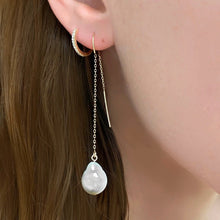 14k gold Mini Baroque Pearl Ear Threaders styled on a ear