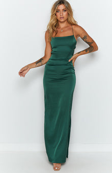 Emerald green satin maxi dress with square neckline, thin straps, and side lace-up detail